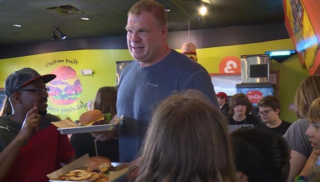 WWE Star Kane Serves Knoxville Guests